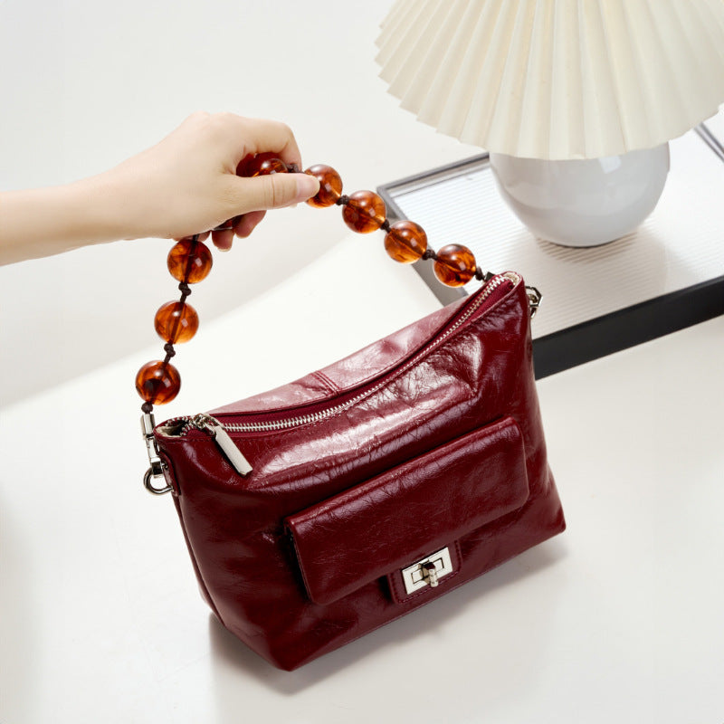IKEARLAX 2025 New Chinese bead chain crossbody shoulder bag women's popular new retro oil wax leather pleated bag hand bag