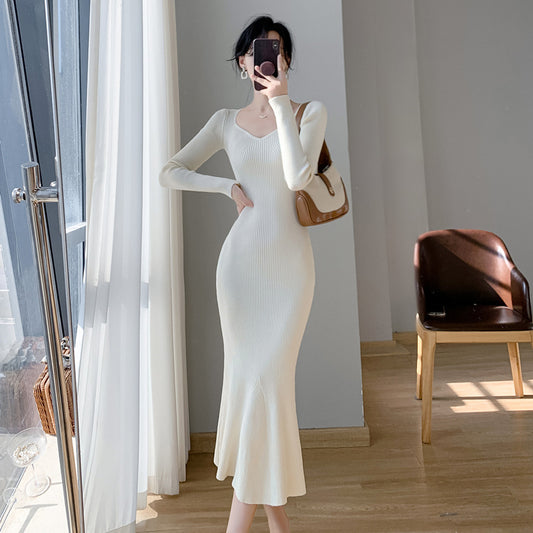2025 Soft waxy knitted sweater dress women's autumn and winter medium and long slim and thin temperament advanced sense hip-wrapped fishtail skirt